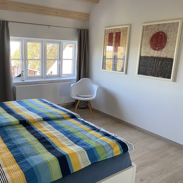 Schlafzimmer in Wohnung Gezeitenblick