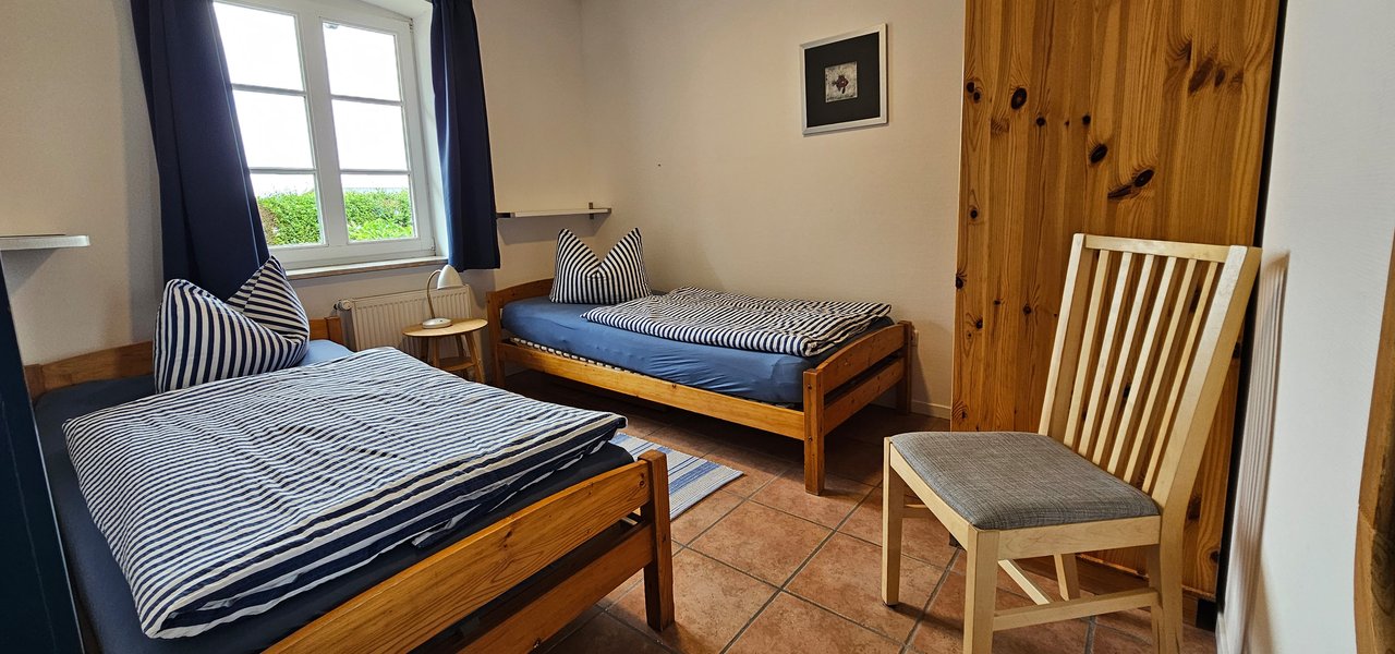 Schlafraum der Wohnung Tidenblick
