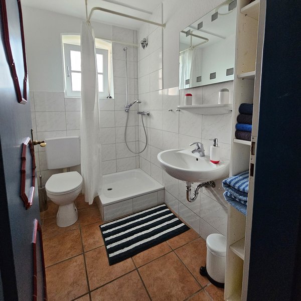 Badezimmer der Wohnung Tidenblick